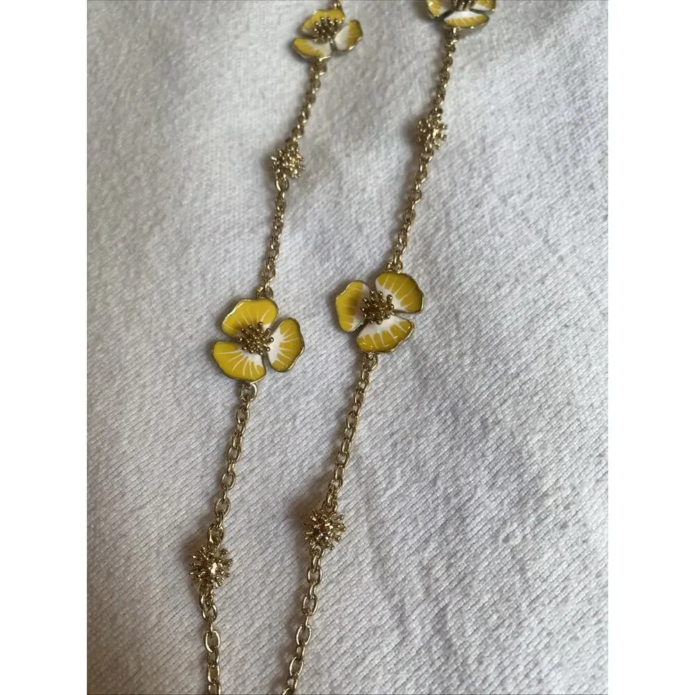 Long Gold Tone Necklace Featuring Yellow Flowers NWOT